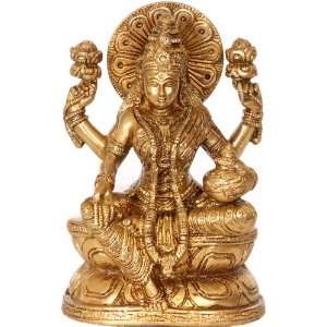 123242173_amazoncom-four-armed-goddess-lakshmi-with-wealth-pot---
